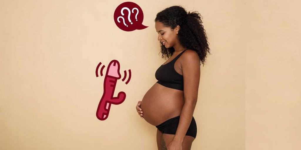 femme enceinte métisse en sous vêtements noirs se posant des questions sur les vibromasseurs